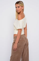 In A Spiral Off Shoulder Knit Top Cream